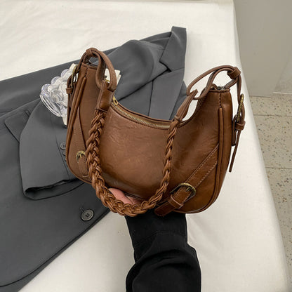 Sac Ovale en Cuir – Élégance et Polyvalence